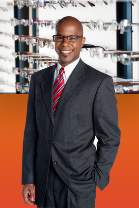 business man standing, in glasses